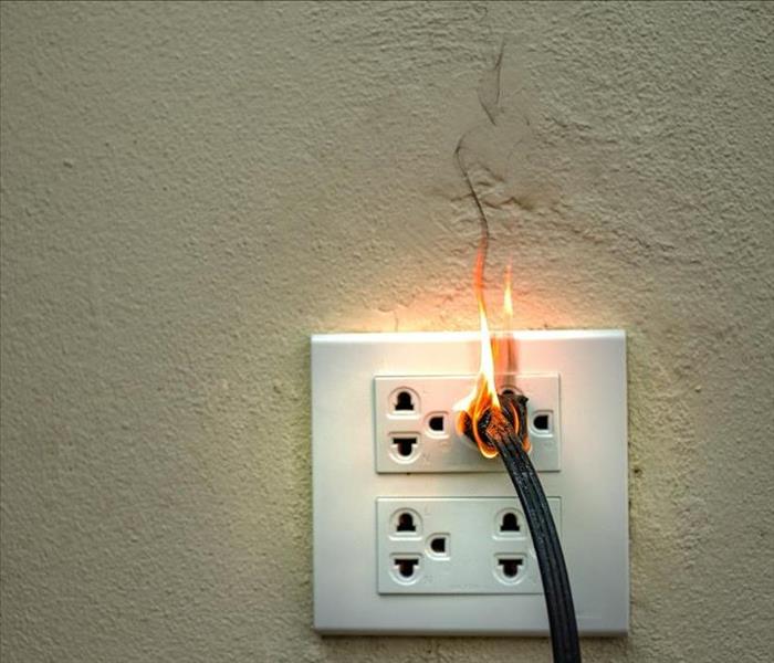 electrical outlet  catching fire